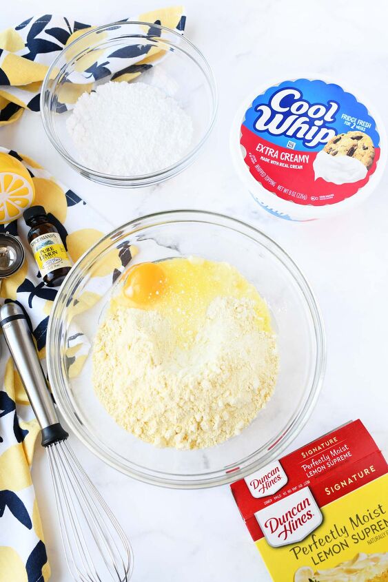 lemon cookies made with cool whip a perfect summer treat, Egg and lemon cake mix in a glass bowl
