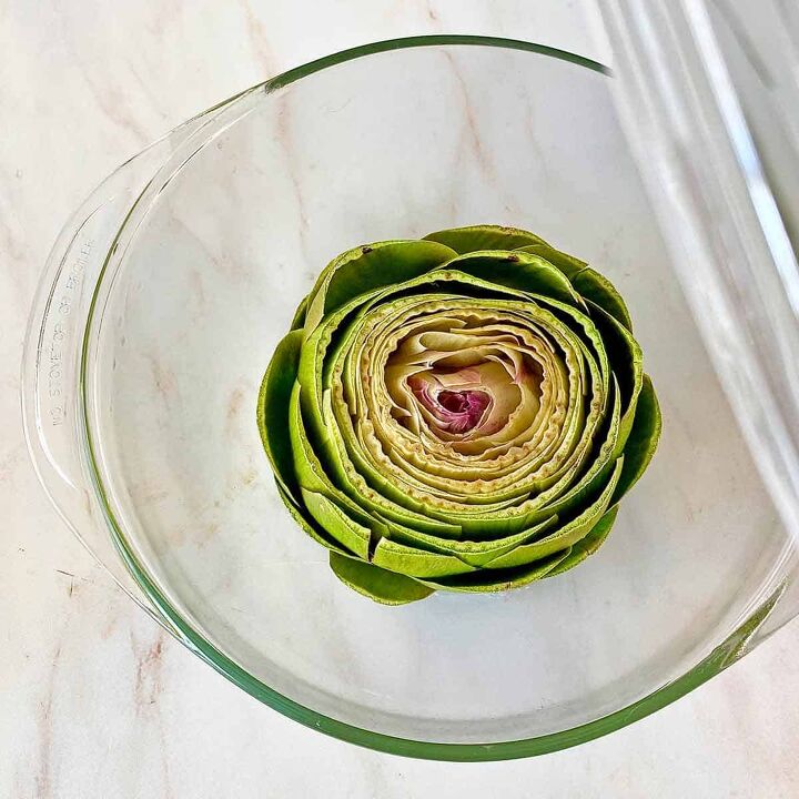 how to microwave an artichoke, An artichoke in a microwave safe bowl ready for cooking