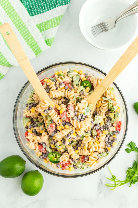 southwest pasta salad, over the top southwest pasta salad with serving fork and spoon inside