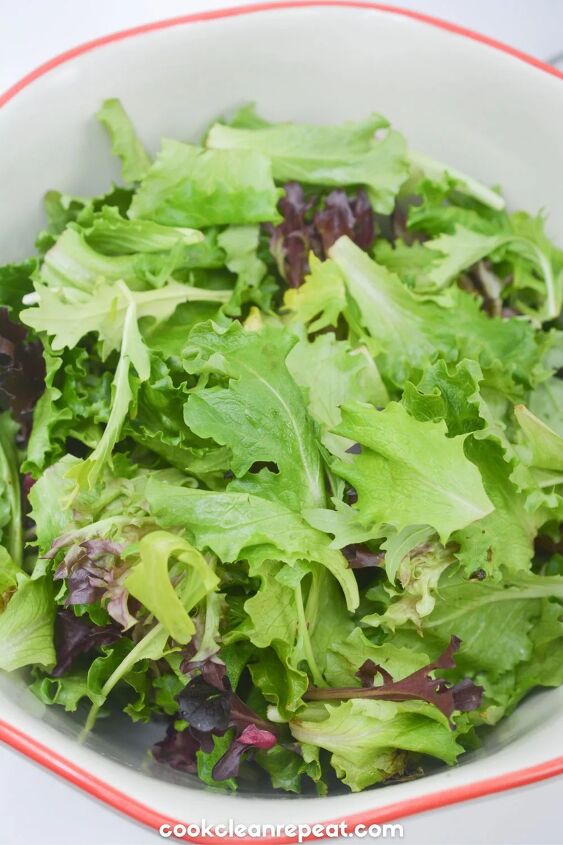keto antipasto salad recipe, leafy greens in a salad bowl