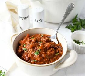 quick and easy classic chili recipe, Bowl of Chunky Chili with with a spoon