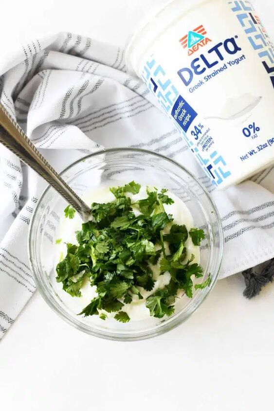 how to make beef chimichanga quick and easy, A glass bowl filled with Greek Yogurt and topped with cilantro