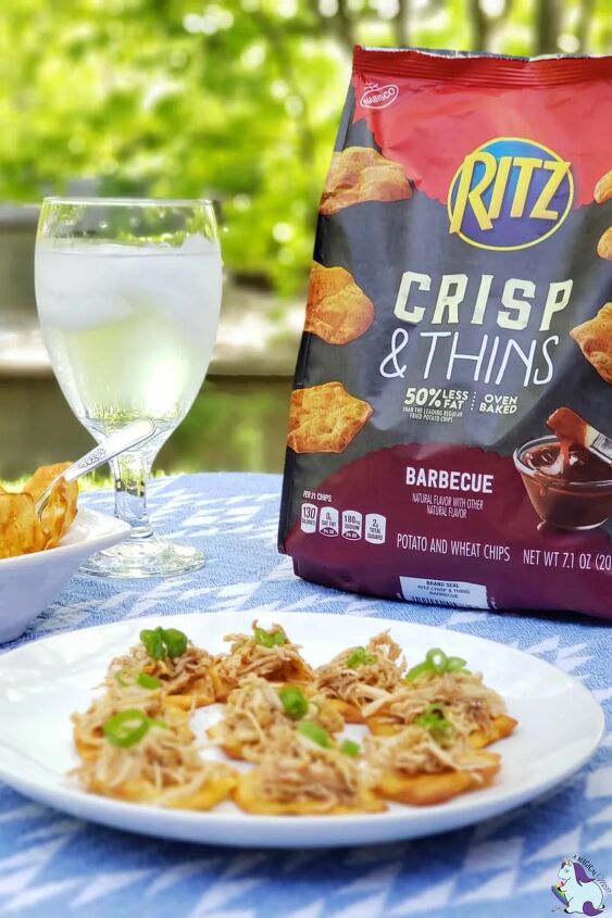 pulled chicken recipe, Ritz Crisps in a bag and on a plate with a glass of water on a table