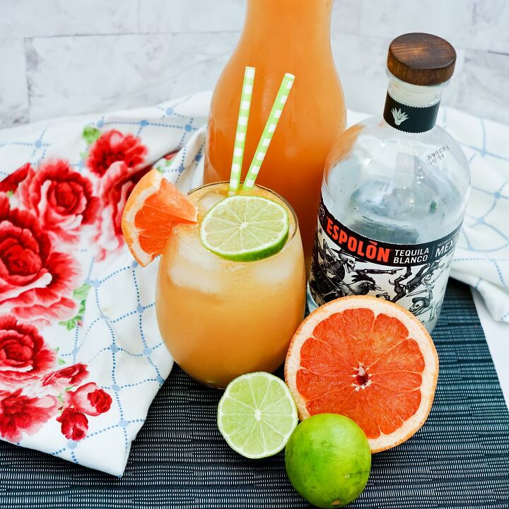 Paloma cocktail on a counter with ingredients