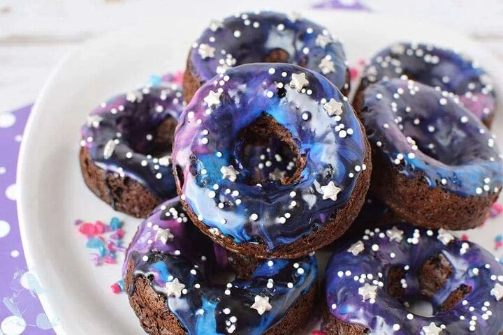 far out baked galaxy cake donuts, Galaxy donuts stacked on a plate