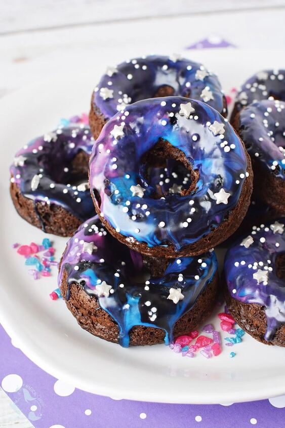 far out baked galaxy cake donuts, Galaxy donuts with star sprinkles stacked on a plate