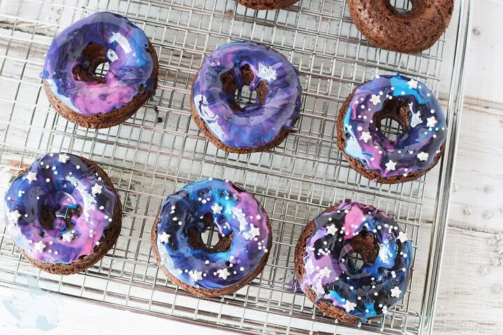 far out baked galaxy cake donuts, Galaxy cake donuts with glaze on a rack