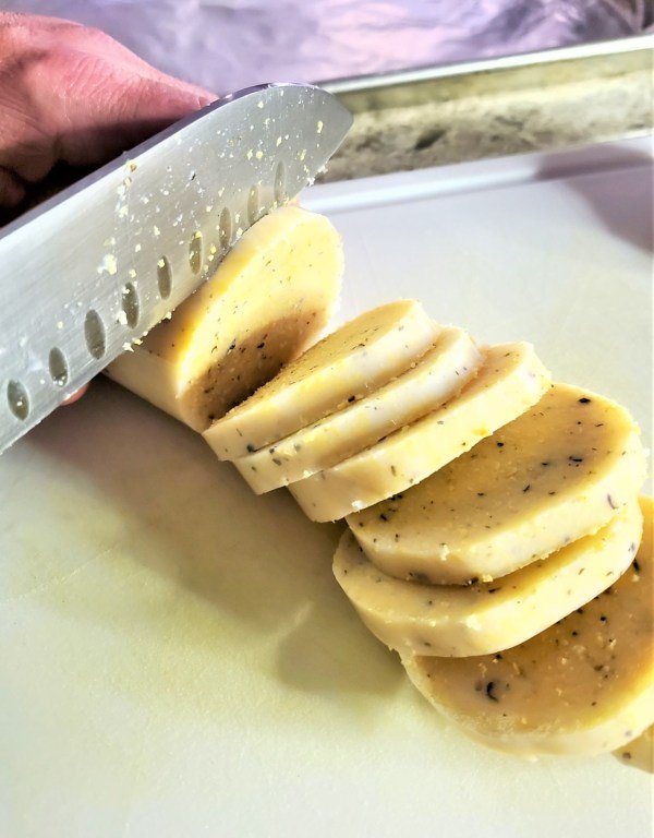 easy delicious baked parmesan polenta chips recipe, slicing polenta into chips