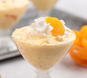 easy mandarin orange dessert with 3 ingredients, mandarin orange dessert with just three ingredients served in vintage serving dishes Topped with whipped cream and canned mandarin oranges