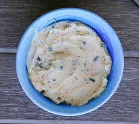 baked greek cod recipe gluten free, Mediterranean compound butter in a blue dish