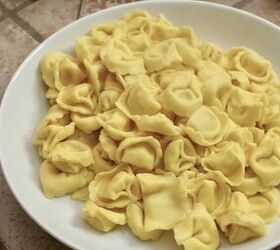 italian tortellini salad, cooked cheese tortellini in a white bowl