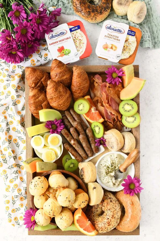 cream cheese stuffed biscuit bites, Alouette Mother s Day Board with purple flowers scattered about