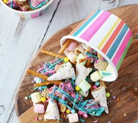 unicorn party snack mix, Unicorn party snack mix spilling out of striped paper cup on cutting board