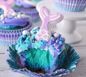 swirly blue and purple mermaid cupcakes, Blue and purple cupcake with a bite taken out
