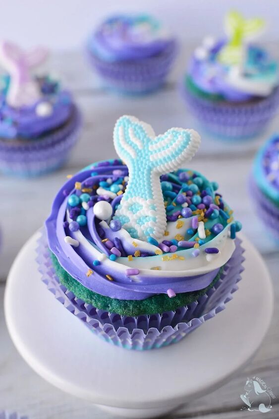 swirly blue and purple mermaid cupcakes, Blue purple and teal cupcake on a white plate