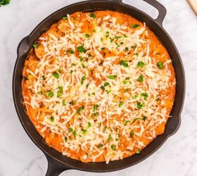 cast iron skillet lasagna, Cast Iron Skillet Lasagna an iron skillet with cheese sprinkled over the top