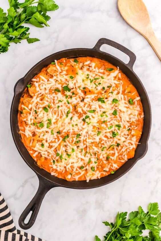 cast iron skillet lasagna, Cast Iron Skillet Lasagna an iron skillet with cheese sprinkled over the top