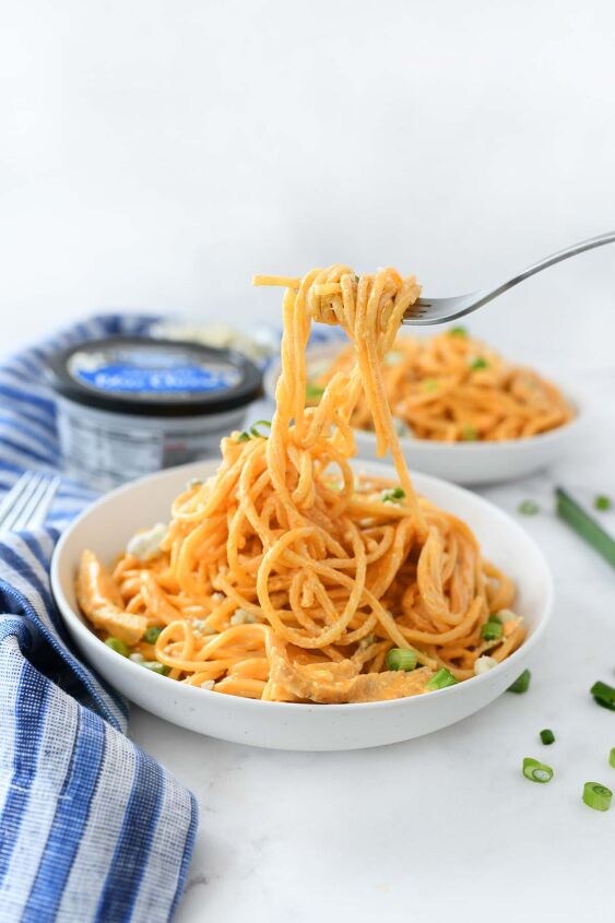delicious buffalo chicken spaghetti, Buffalo sauce pasta in a white plate with a fork