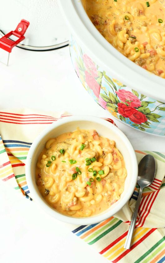 slow cooker sausage macaroni cheese, A bowl of macaroni and cheese on a white table