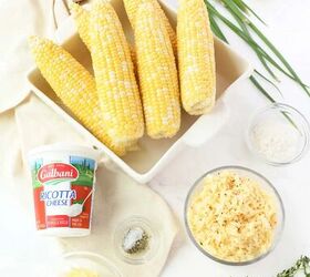 cheesy grilled corn ricotta dip, Grilled corn dip ingredients on a white table