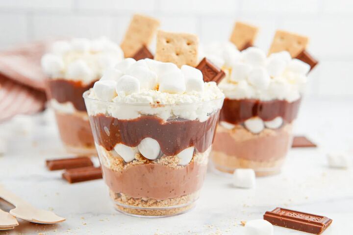 unforgettable s mores pudding cups recipe, Layered pudding cups with chocolate pudding marshmallows whipped cream and graham crackers