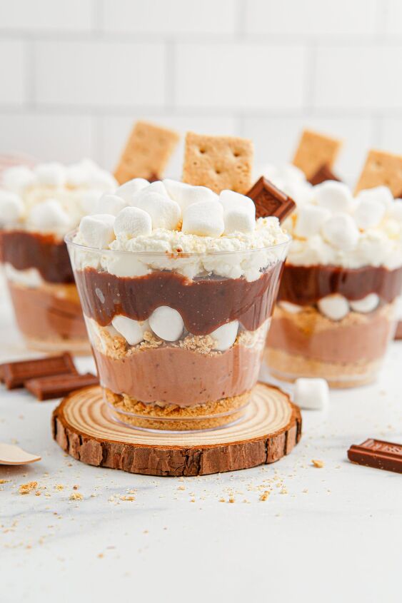 unforgettable s mores pudding cups recipe, Layers of pudding marshmallow whipped cream and graham crackers in little cups