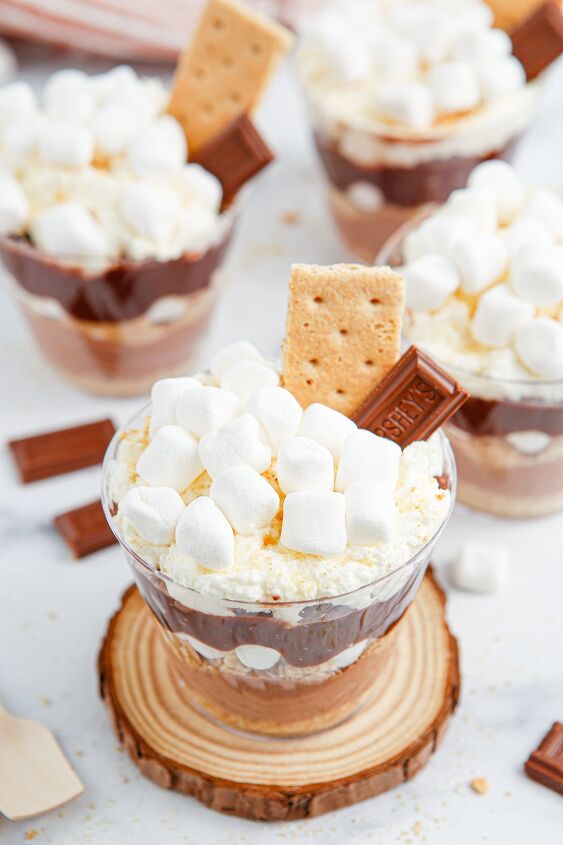 unforgettable s mores pudding cups recipe, Pudding desserts topped with marshmallows chocolate and graham crackers