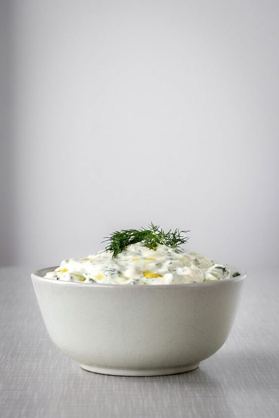 tzatziki, A bowl filled with tzatziki garnished with dill