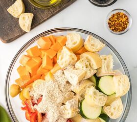 sheet pan sausage and veggies, Vegetables and bread in a bowl with spice mix for sheet pan sausage and veggie recipe