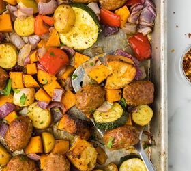 sheet pan sausage and veggies, Sheet Pan Sausage and Veggies with a spatula after coming out of the oven