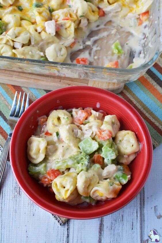 the easiest chicken broccoli bake with tortellini ever, Chicken broccoli bake with tortellini in a red bowl