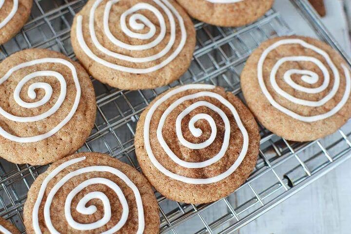 chewy cinnamon roll cookies with icing swirl, Cinnamon cookies on a baking rack with icing swirl