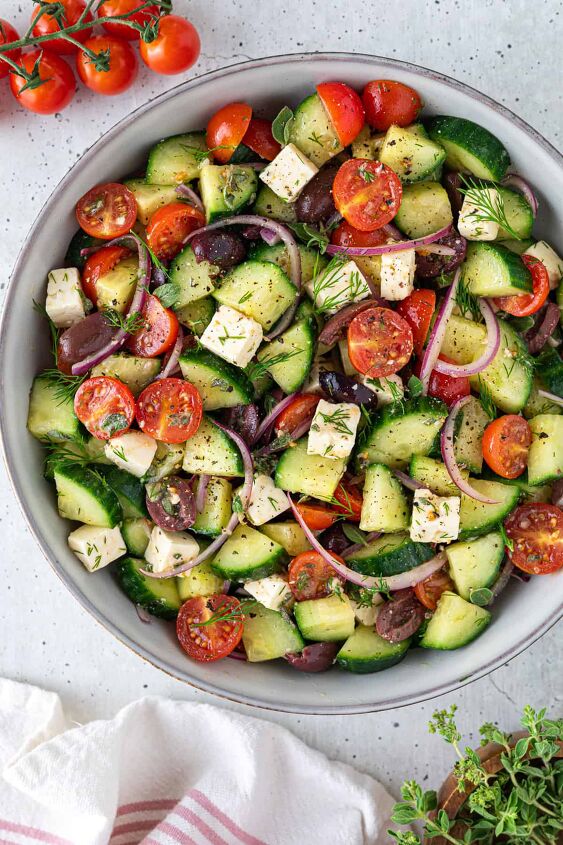 easy greek cucumber salad with feta, A bowl of Greek cucumber salad
