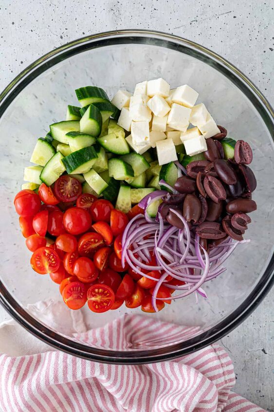easy greek cucumber salad with feta, Toss the vegetables and cheese in a large bowl