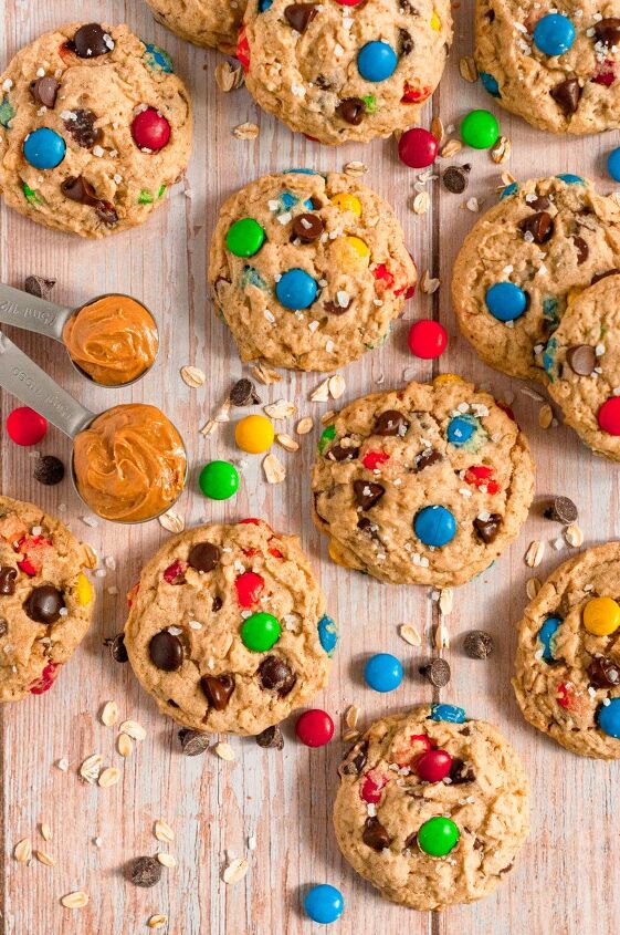 gluten free monster cookies vegan, Light golden brown monster cookies full of chocolate chips and brightly colored M M style chocolate candies