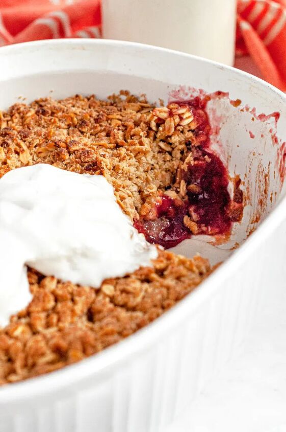 gluten free rhubarb crisp vegan, A delicious pink rhubarb crisp topped with golden brown oat crisp topping and served with fresh whipped cream