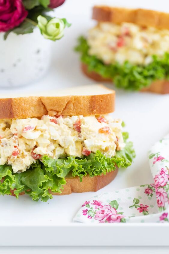 my great grandma s interesting radio egg salad recipe, egg salad stuffed into white sliced bread and lined with green leaf lettuce