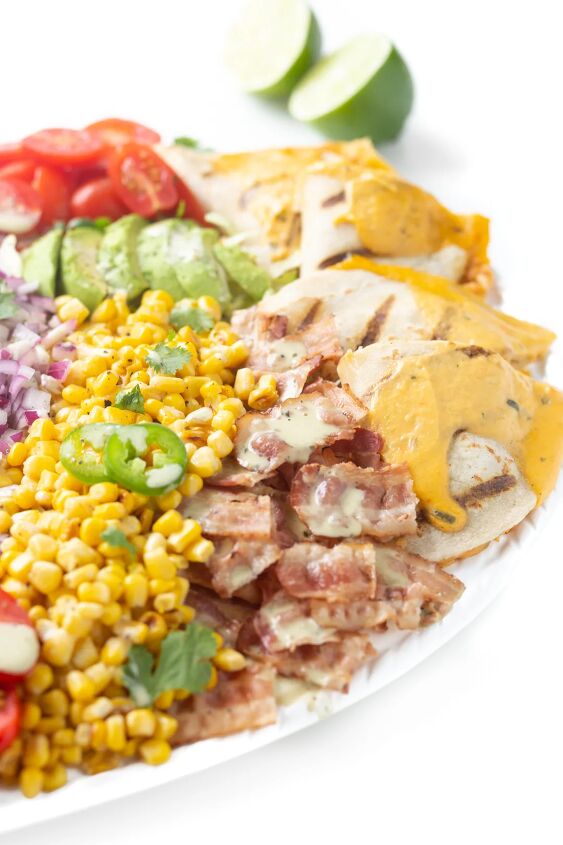 this family style quesadilla salad is better than restaurant versions, close up of salad with bacon quesadillas diced onion