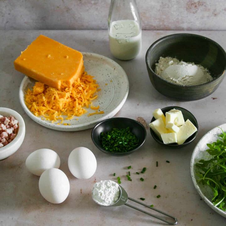 cheddar and chive savory dutch baby, ingredients for cheddar and chive savory dutch baby Photographed on pink marble