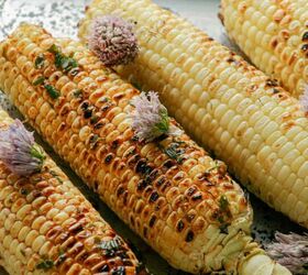 grilled corn with herbed chili butter, Grilled corn on the cob with herbed garlic butter Photographed on a metal baking tray
