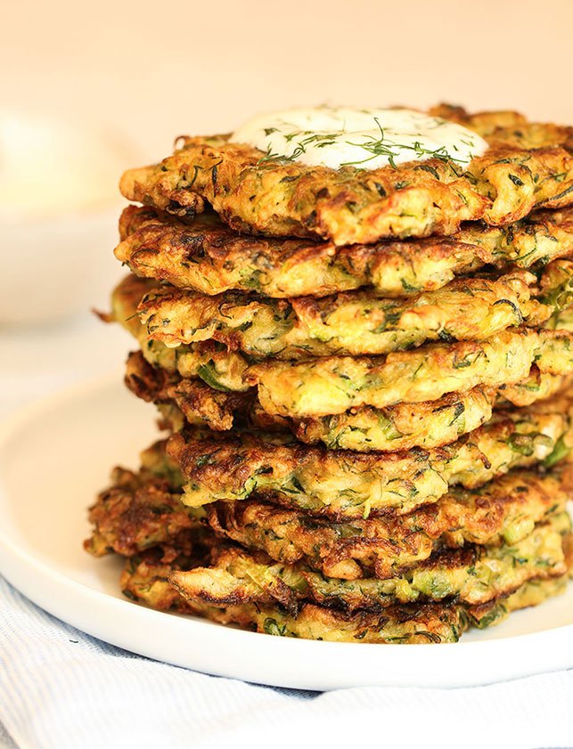 the best savoury zucchini pancakes courgette pancakes, The pancakes on a white plate