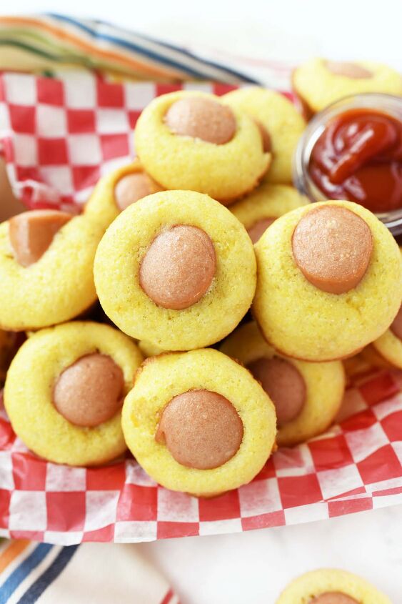 mini corn dog muffin bites, A red checkered basket of mini corn dog muffins