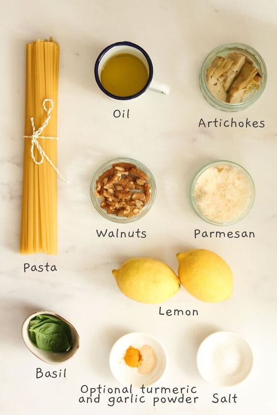 lemon pesto pasta sauce with artichoke, All recipe ingredients laid out on a white background