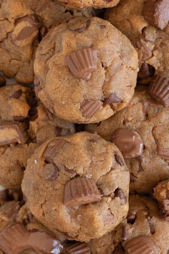 the peanut butter cup cookies recipe you ll make again and again, over the top view of lots of peanut butter cup cookies