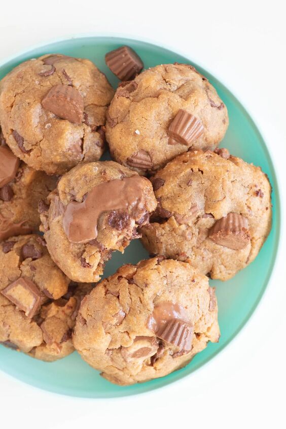 the peanut butter cup cookies recipe you ll make again and again, small teal plate filled with chunky peanut butter cup cookies