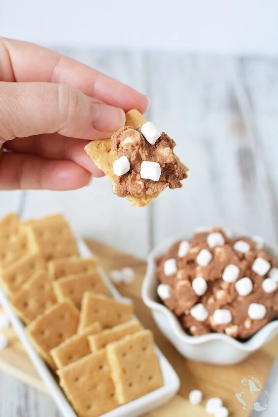 chocolatey s more eggless cookie dough recipe, Dipping a graham cracker into s mores cookie dough dip