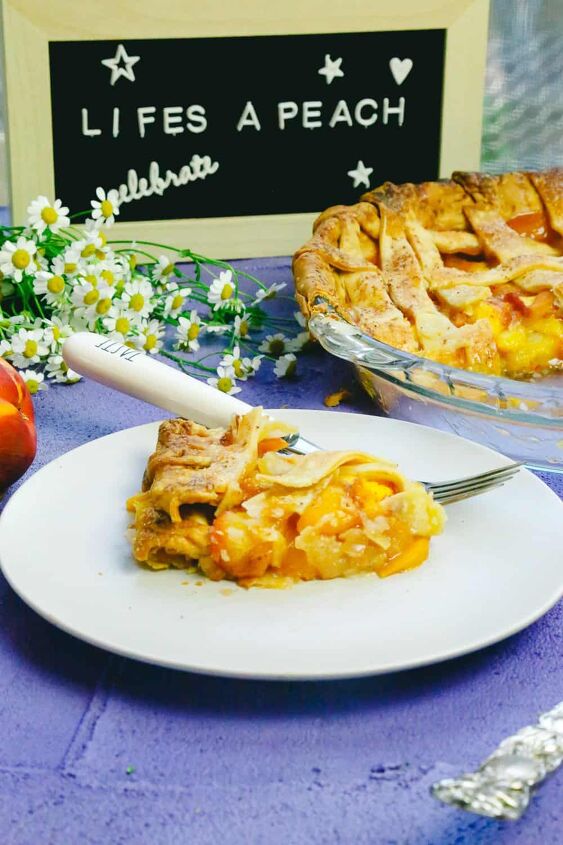 honey peach pie homemade, Homemade Honey peach pie on a plate with a fork and sign behind it made with lattice crust and fresh peaches