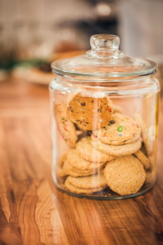 the best of the peanut butter cereal cookie recipes, A glass canister full of cookies
