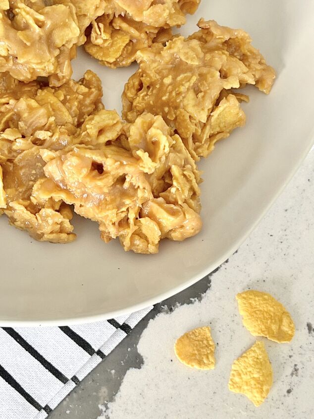 the best of the peanut butter cereal cookie recipes, A white plate full of peanut butter corn flake cookies