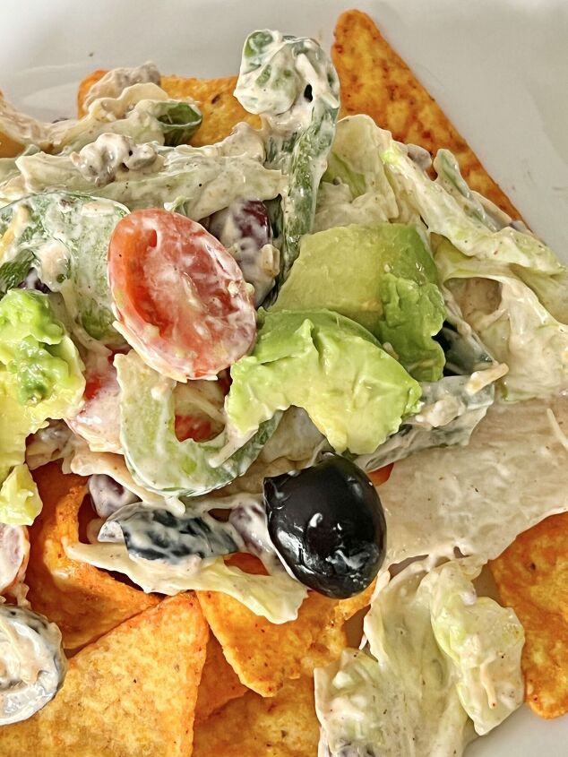 quick and easy healthy mexican salad recipes, A Mexican tostada salad with tortilla chips and a creamy taco dressing